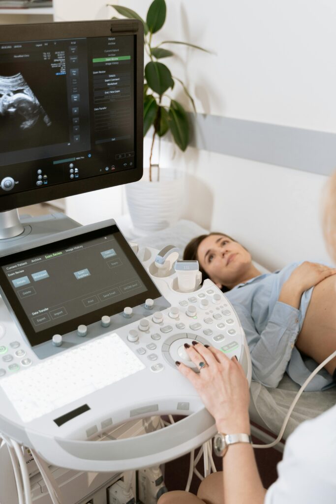 a pregnant woman in a hospital bed